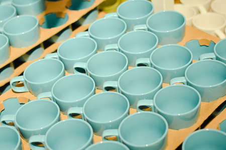 lot of blue cups on shelfの写真素材