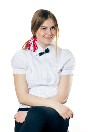 Joyful exciting girl on a light background, closeup portraitの写真素材