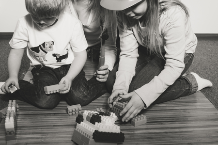 Joyful exciting girls on a light background, closeup portrait. Youth, love, happiness and excitementの写真素材