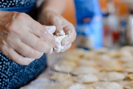 Close up of ravioli on table background tasty traditional food. Fresh dumplings cooking preparationの写真素材