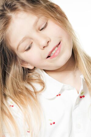 Portrait of adorable beautiful young lady looking at camera over light background. Healthy, emotional, peaceful joyful happinessの写真素材