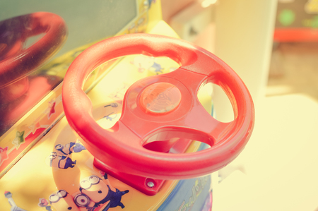 Close up on colorful detail of children playground park abstract background. Playful happiness time, having fun, blurred imageの写真素材