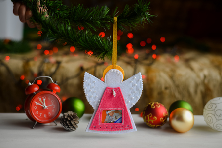 Beautiful decorative colorful angel design, flower ribbon for special event. Festive, birthday, christmas and new year gift background. Close up image of joyful element and creative love cardの写真素材