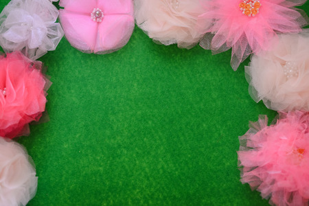 Beautiful decorative colorful bow design, flower ribbon for special event. Festive, christmas and new year gift background. Close up image for joyful texture element and creative love card surfaceの写真素材
