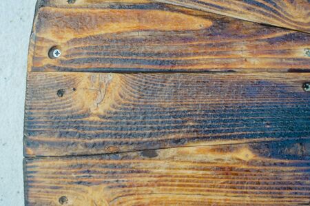 Close up view of old wood bench table for natural textured abstract surface background. Top view...