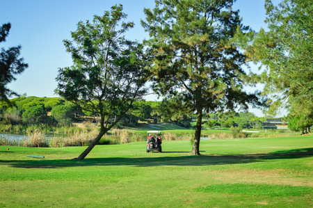 Golf field on sunny outdoors luxury lifestyle backgroundの写真素材