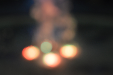 Night bokeh shiny glowing lights city street outdoors, blurred effect abstraction image backgroundの写真素材