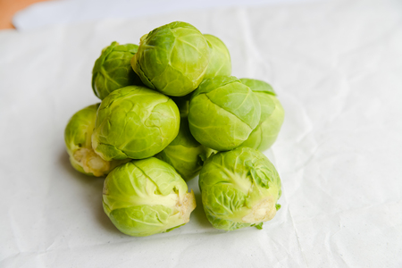 a pile of Brussels sprouts on a white backgroundの写真素材