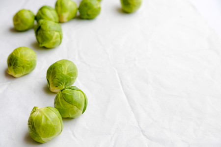a pile of Brussels sprouts on a white backgroundの写真素材