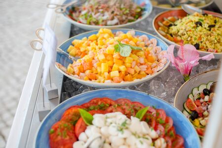 Close up of salad bar with assortment of ingredientsの写真素材