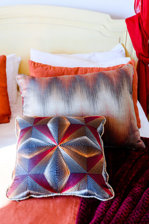 Side table with white lamp in the bedroom