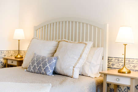 Beautiful luxury pillow on the bed decoration in bedroom interior - Light Vintage Filter
