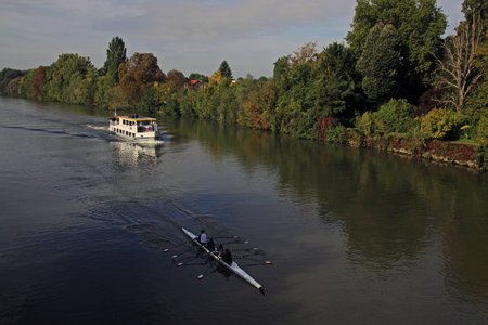 Yacht and canoe in autumn season on the river. September 26, 2017. Auvers-sur-Oise, Ãle-de-France, France. Editorial photoのeditorial素材