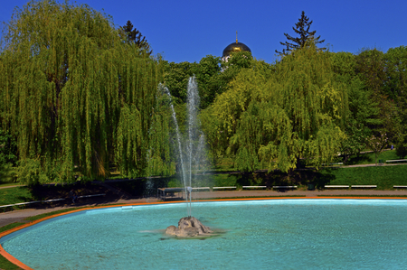 View from the top to the big fountain in the empty parkの写真素材