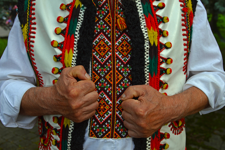Hutsul in an embroidered shirt and sheepskin sleevelessの写真素材