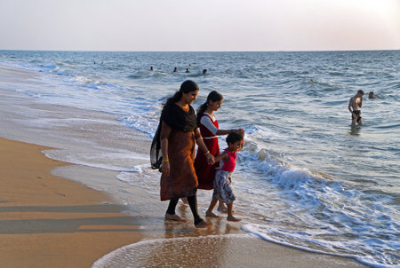 Swimming and fun on the sandy Marari beach near city Kochi, Kerala, India. January 06, 2020. Editorial Photoのeditorial素材