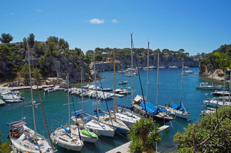 Moored boats and yachts in Calanque de Port Miou, department of Bouches-du-RhÃ´ne, France. July 25, 2020 Editorial photoのeditorial素材