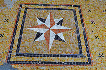 A fragment of the sidewalk on Ugo Bassi Street in Bologna, Italyの写真素材