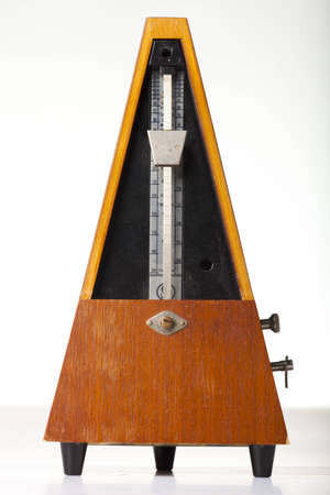musical metronome on a white