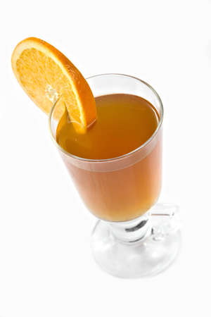 Cup of ice tea and orange on a white backgroundの写真素材