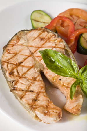 Baked salmon steak with  veggies  Viewed from above の写真素材