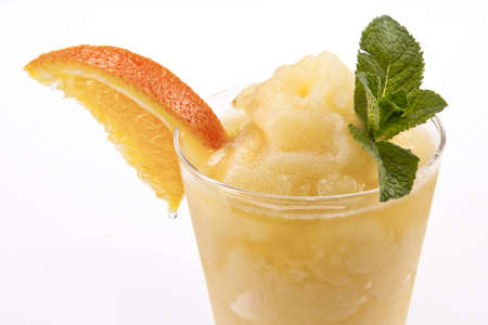 Cocktail with orange isolated on whiteの写真素材