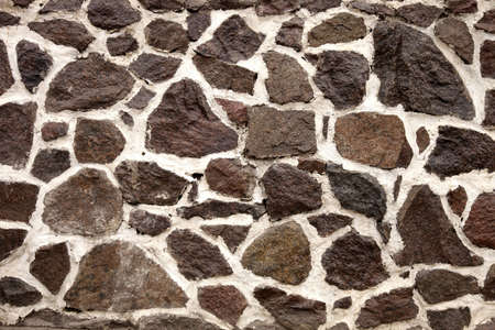 stone wall rock construction pattern texture backgroundの写真素材