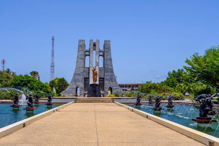 ACCRA,GHANA - APRIL 11 2018: Kwame Nkrumah Memorial Park with ornate marble Mausoleum and gold...