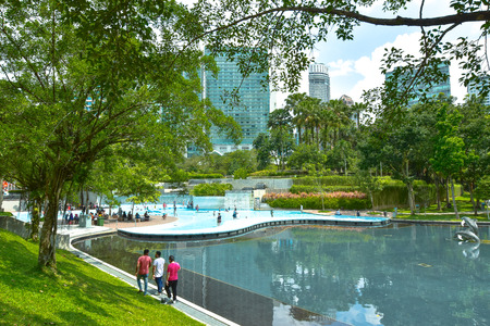 KLCC city Park. City park in sunny day near Petronas twin towers, KLCC  Kuala Lumpur Malaysia.のeditorial素材
