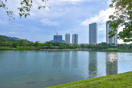 Summer season lake, trees And Green Grass at Desa park city Kuala Lumpur Malaysia. 2017のeditorial素材