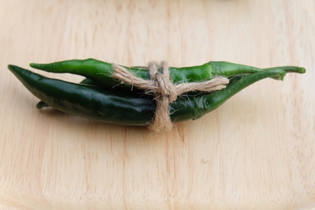 green chili peppers. Domestic cultivation extra hot chilli burn. Growing chili peppers. Spicy seasoning food. Healthy spices.の写真素材