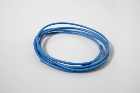 Electric wire in a white backgroundの写真素材