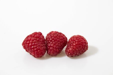 Rasberries in a white backgroundの写真素材