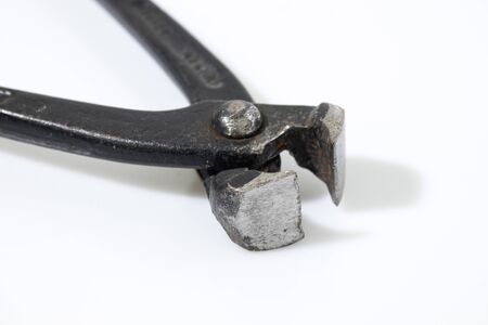 Pincer tool in a backgorund compsoitionの写真素材