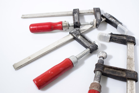 Clamps for wood in a white backgroundの写真素材