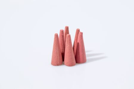 Red incense in a white backgroundの写真素材