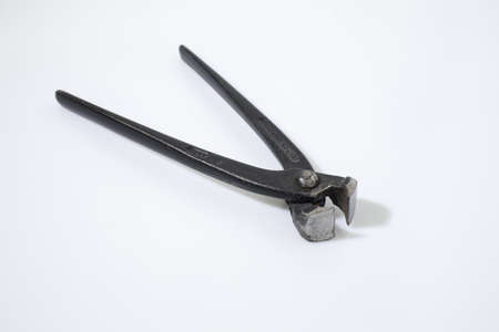 Pincer tool in a backgorund compsoitionの写真素材