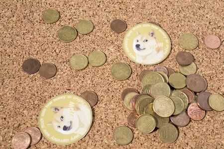 Cryptocurrency euro coins and dogecoin in a composition