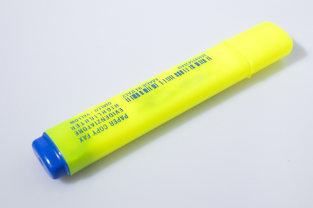Chancellery colored highlighter in a white background composition