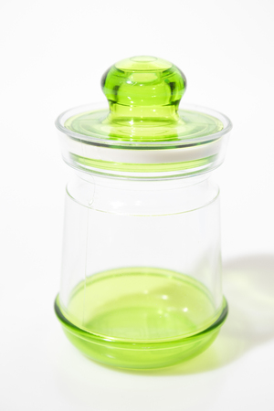Green decorated jar isolated in a white background compositionの写真素材