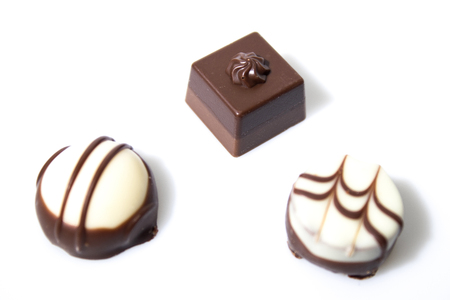 Detailed chocolates isolated in a white background composition