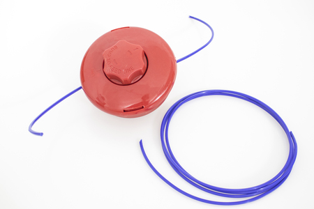 Red trimmer head with a blue wire composition