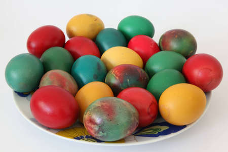 Easter eggs in different colors - red, orange, green.の写真素材