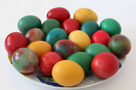 Easter eggs in different colors - red, orange, green.の写真素材