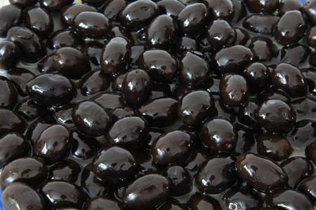 Black olive in olive oilの写真素材