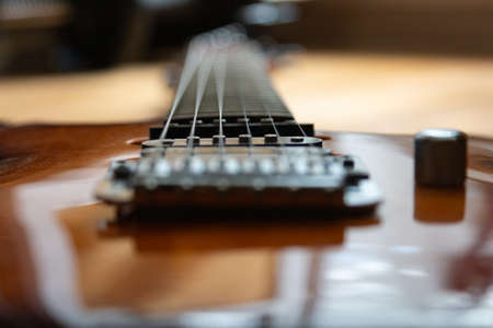 guitar bridge laying on the floorの写真素材