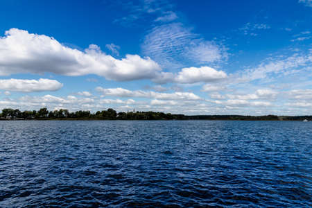 blue sky, white clouds and lake.の写真素材