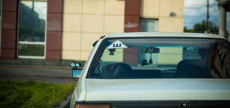 Russia, Saint-Petersburg - 30 Jun 2020: parked car in front of the buildingのeditorial素材