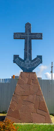 Russia, Saint-Petersburg - 26 July 2020: an anchor cross mounted on a pedestalのeditorial素材