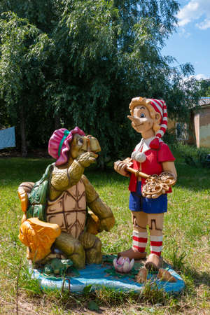 Russia, Luga, Leningrad oblast - 11 July 2020: photo shows the characters of the cartoon "The Golden Key, or the Adventures of Pinocchio".のeditorial素材
